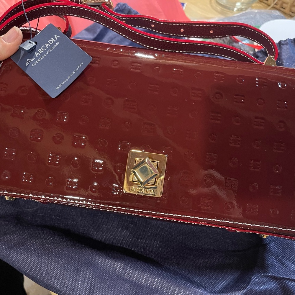 Arcadia Deep Red Patent Shoulder Bag with adjustable leather strap.new